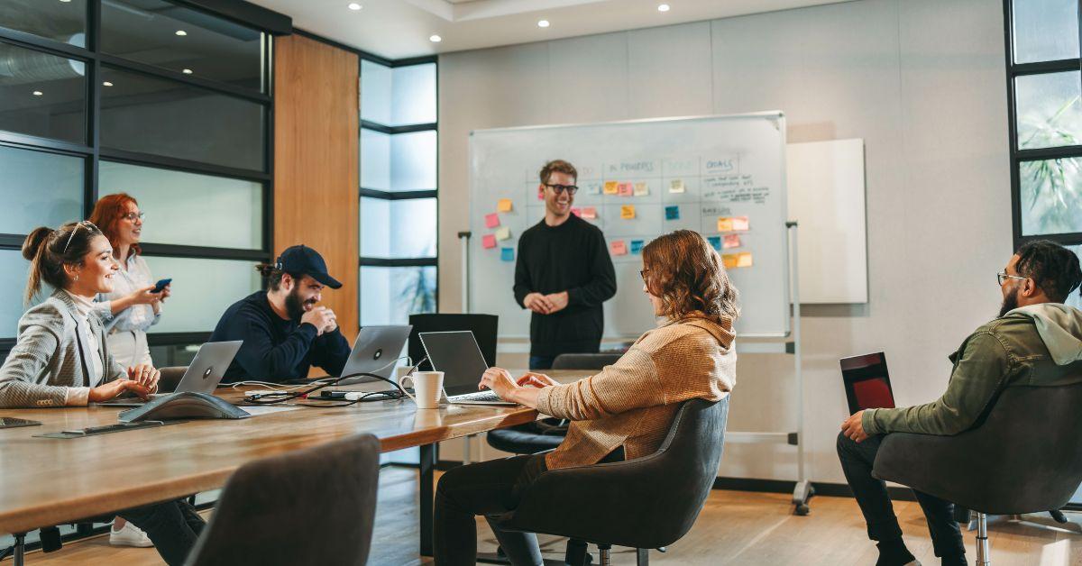A group of people having a meeting and looking professional.